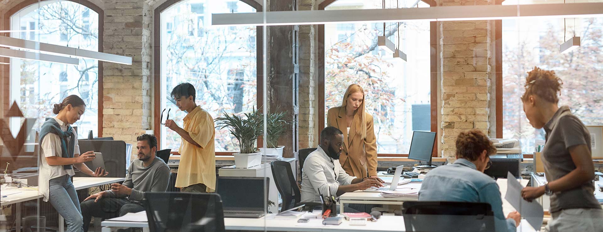 Business team collaborating in a modern office — website planning and design strategy