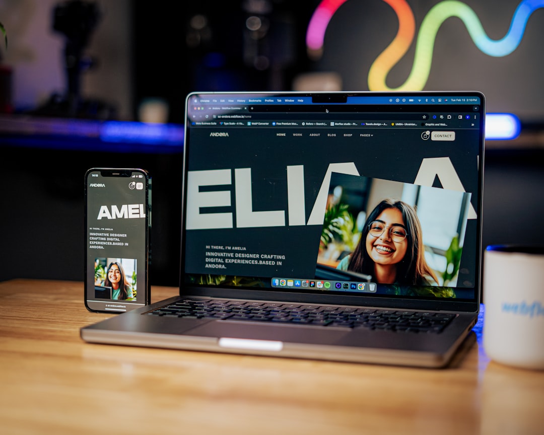 a laptop computer sitting on top of a wooden table — IL WebDesign Manhattan
