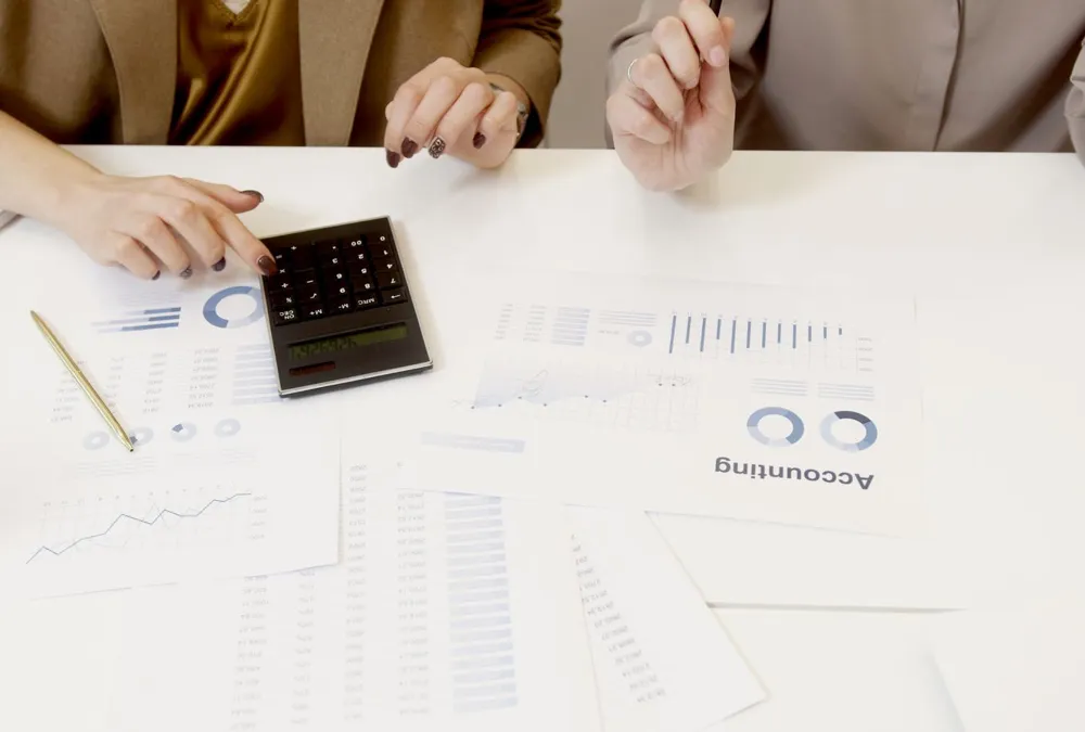 Accounting reports and charts on a desk