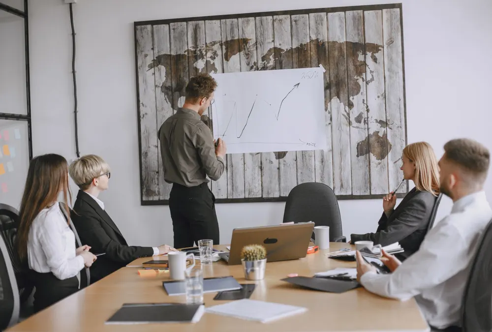 Consultants working together in a boardroom