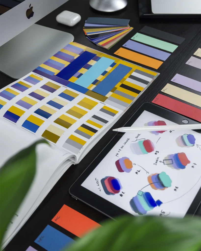 Brand color palettes and custom design elements used to redesign a business website