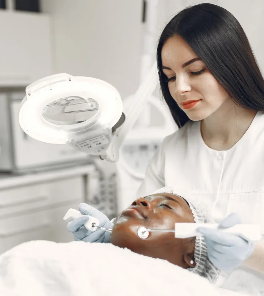 Dermatology specialist performing a skin care treatment