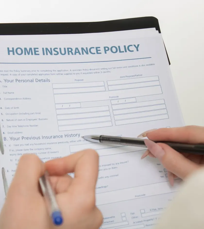 Insurance agent reviewing coverage paperwork