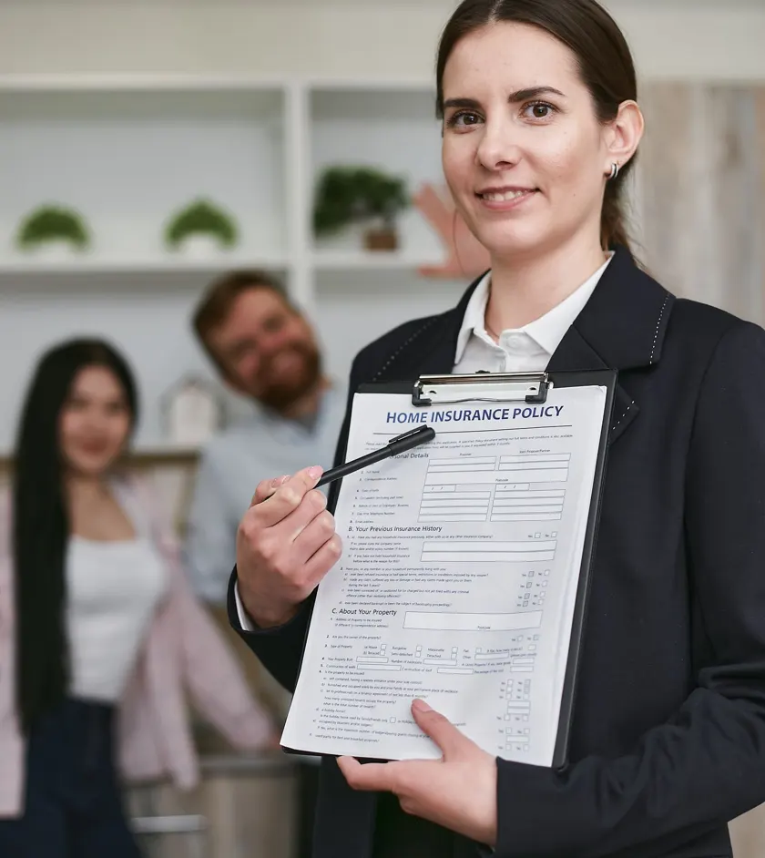 Insurance professionals reviewing documents together