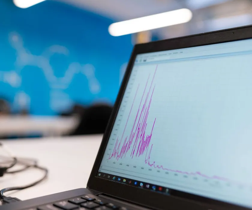 Laptop screen showing website traffic analytics graph