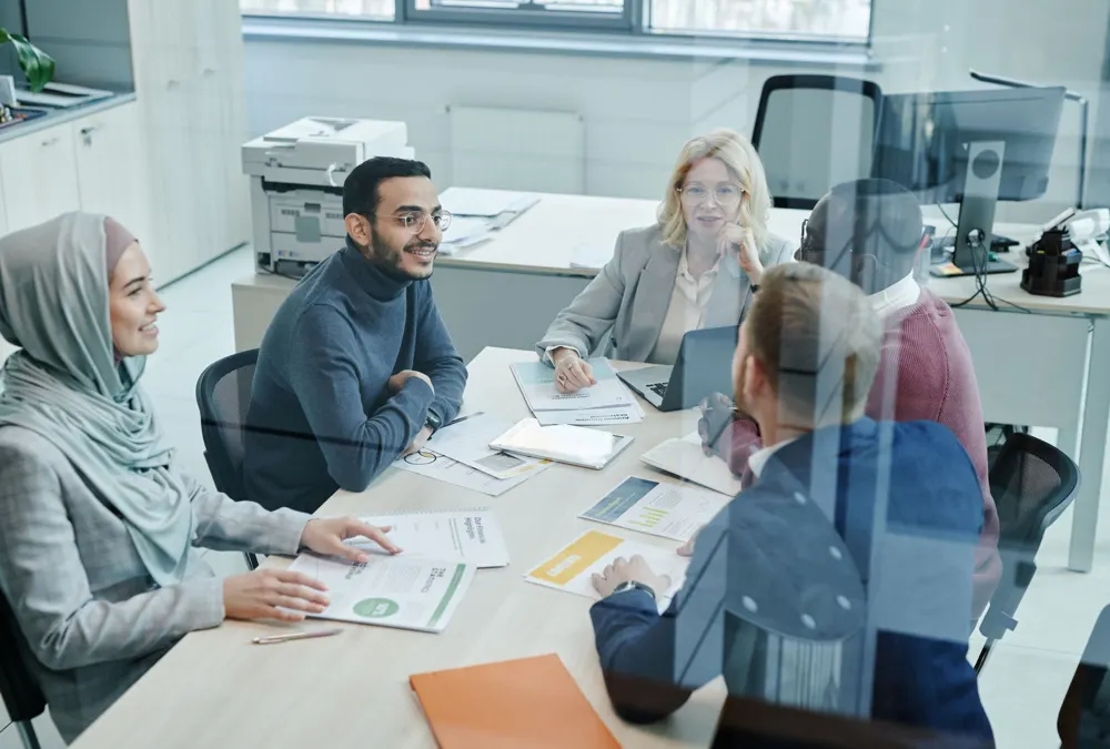 Nonprofit team meeting around a table