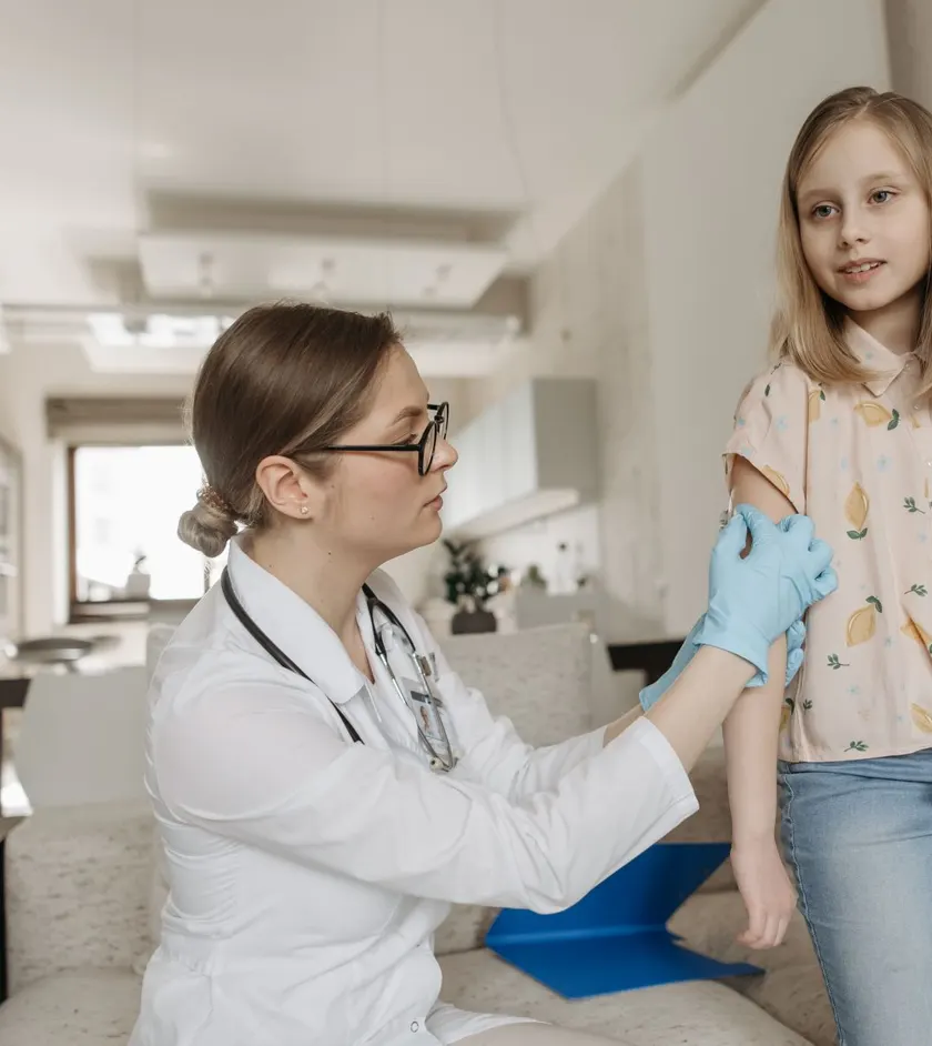Pediatrician giving a child a check-up