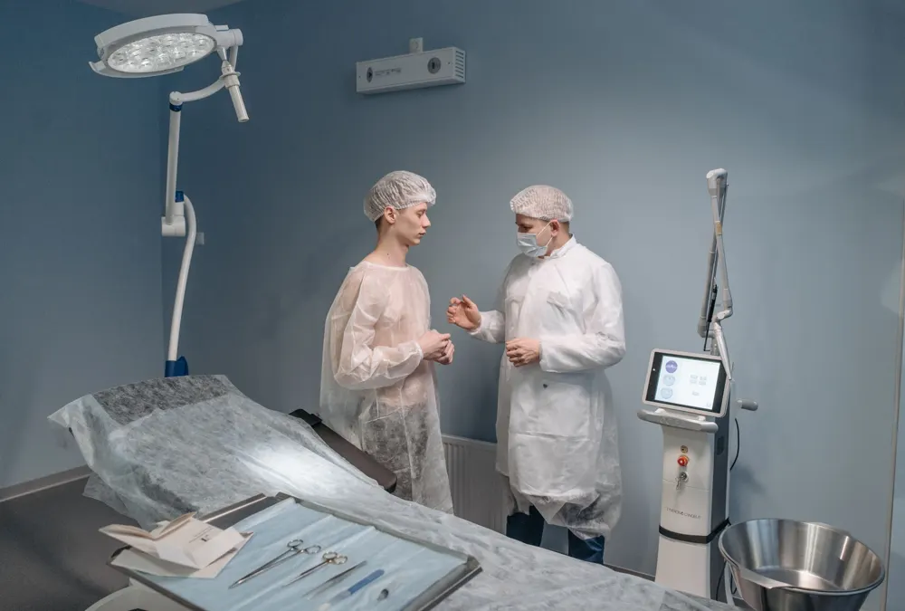 Surgical treatment room with medical staff
